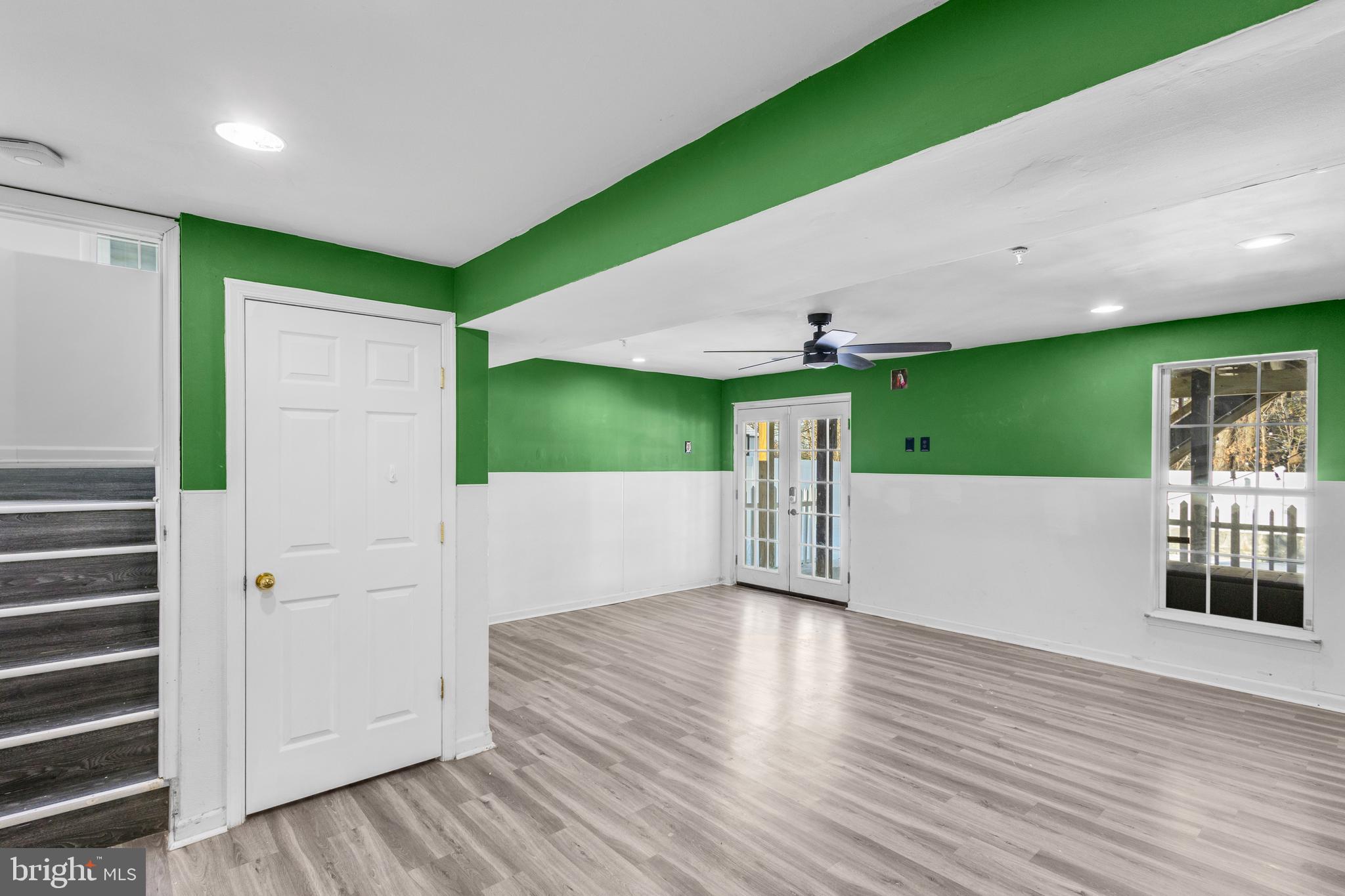 7510 Maury Road Baltimore, MD 21244 - Photo 27 of 39 a view interior of a house with wooden floor and windows