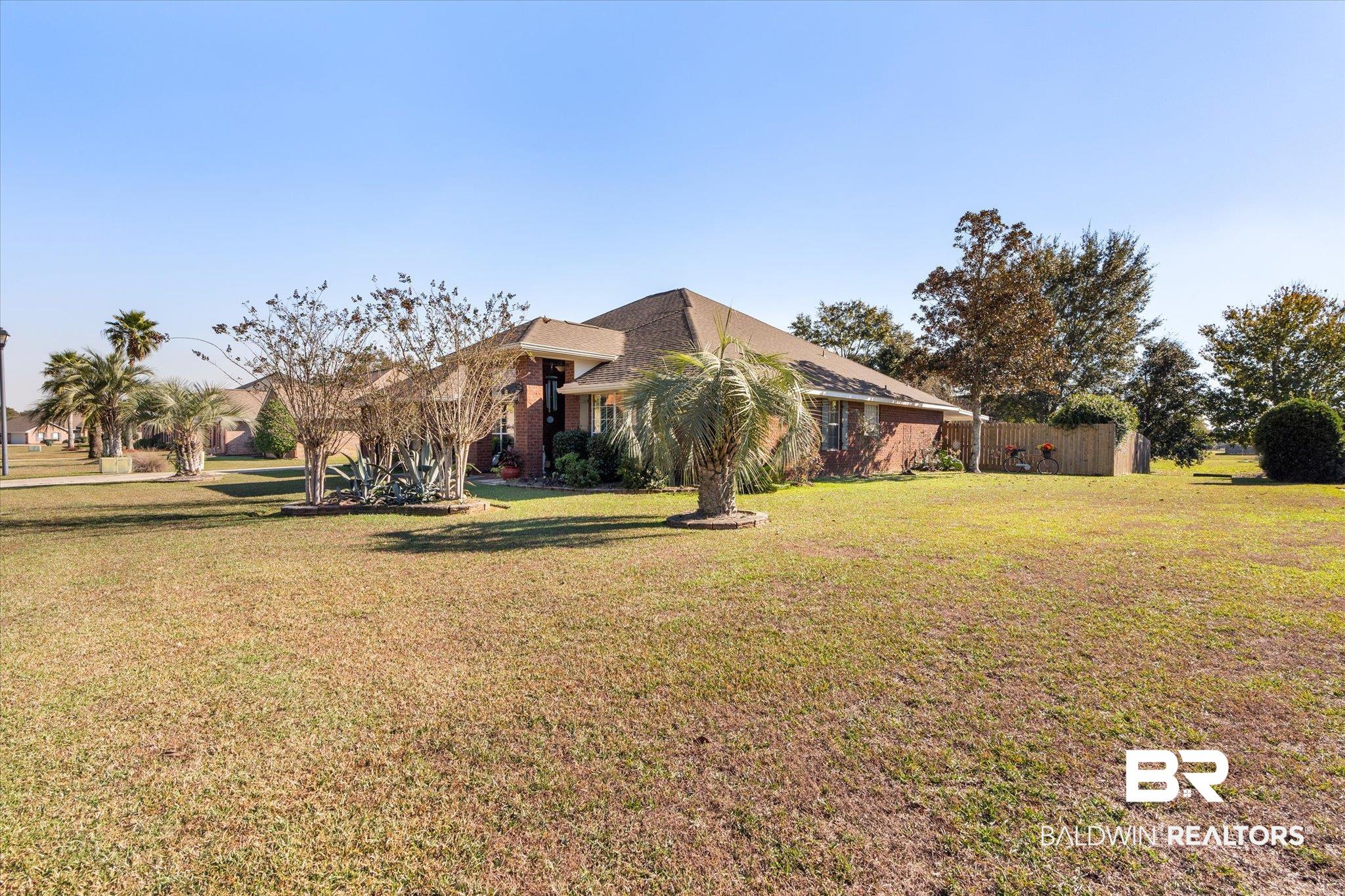 356 Collinwood Loop Foley, AL 36535 - Photo 20 of 21 View of front of property with a front lawn