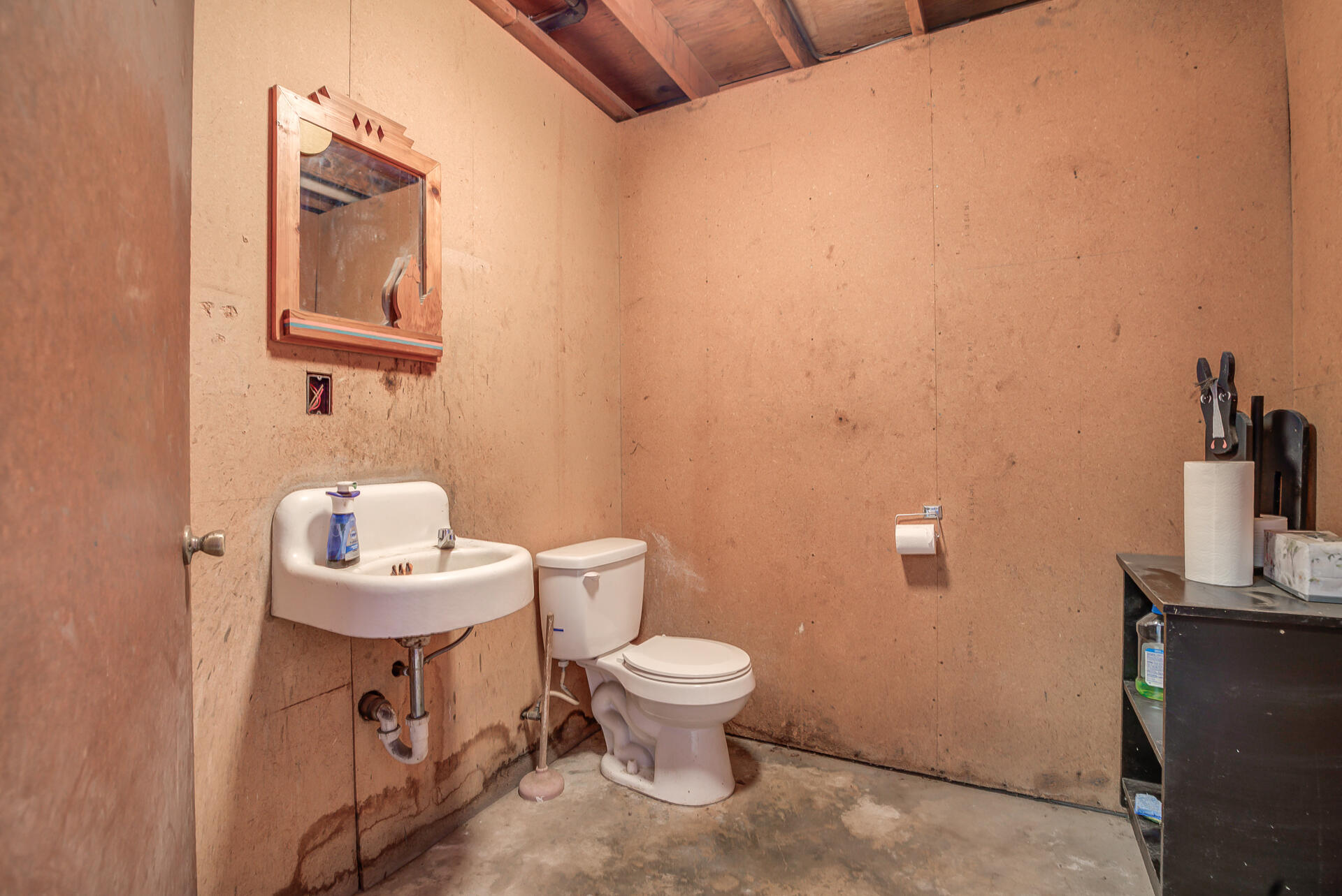 17536 Oly Way Anderson, CA 96007 - Photo 47 of 51 a bathroom with a toilet a sink and mirror