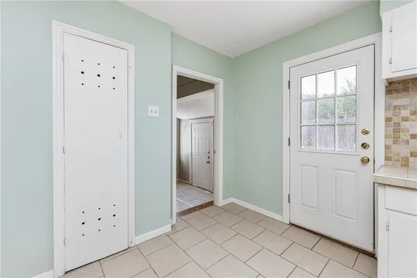 a view of an empty room with window