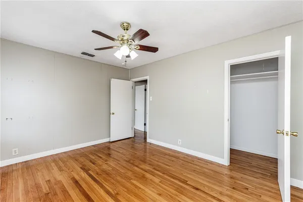 a view of a balcony with chairs