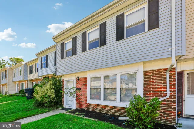 a house view with garden space