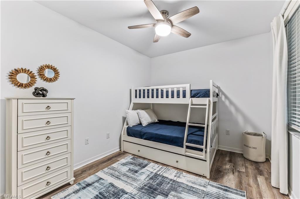 Undisclosed Address Punta Gorda, FL 33982 - Photo 11 of 14 a bedroom with a bed and a window