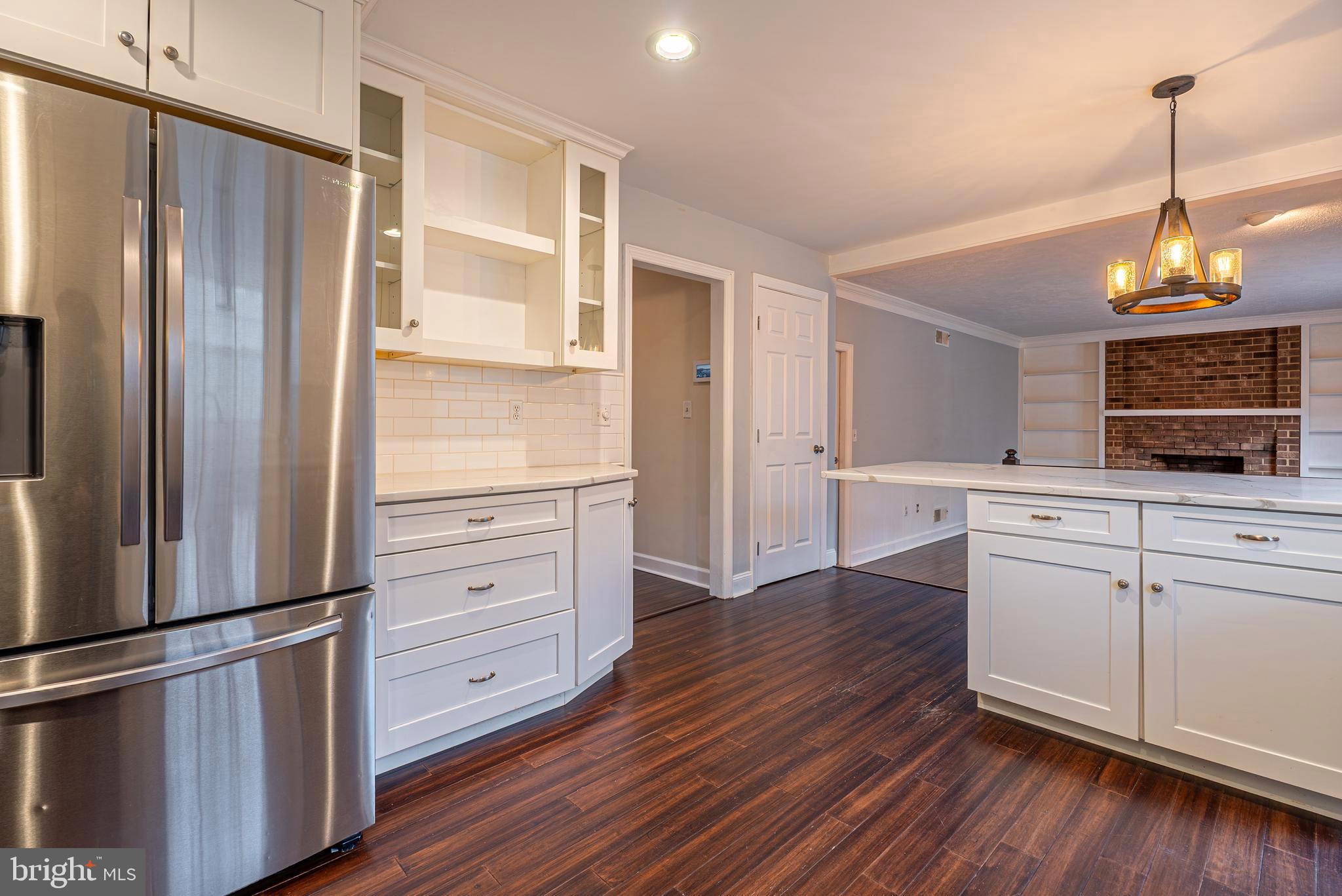 15117 Trail Ridge Road Southwest Cumberland, MD 21502 - Photo 15 of 43 a kitchen with stainless steel appliances granite countertop a refrigerator and a stove top oven