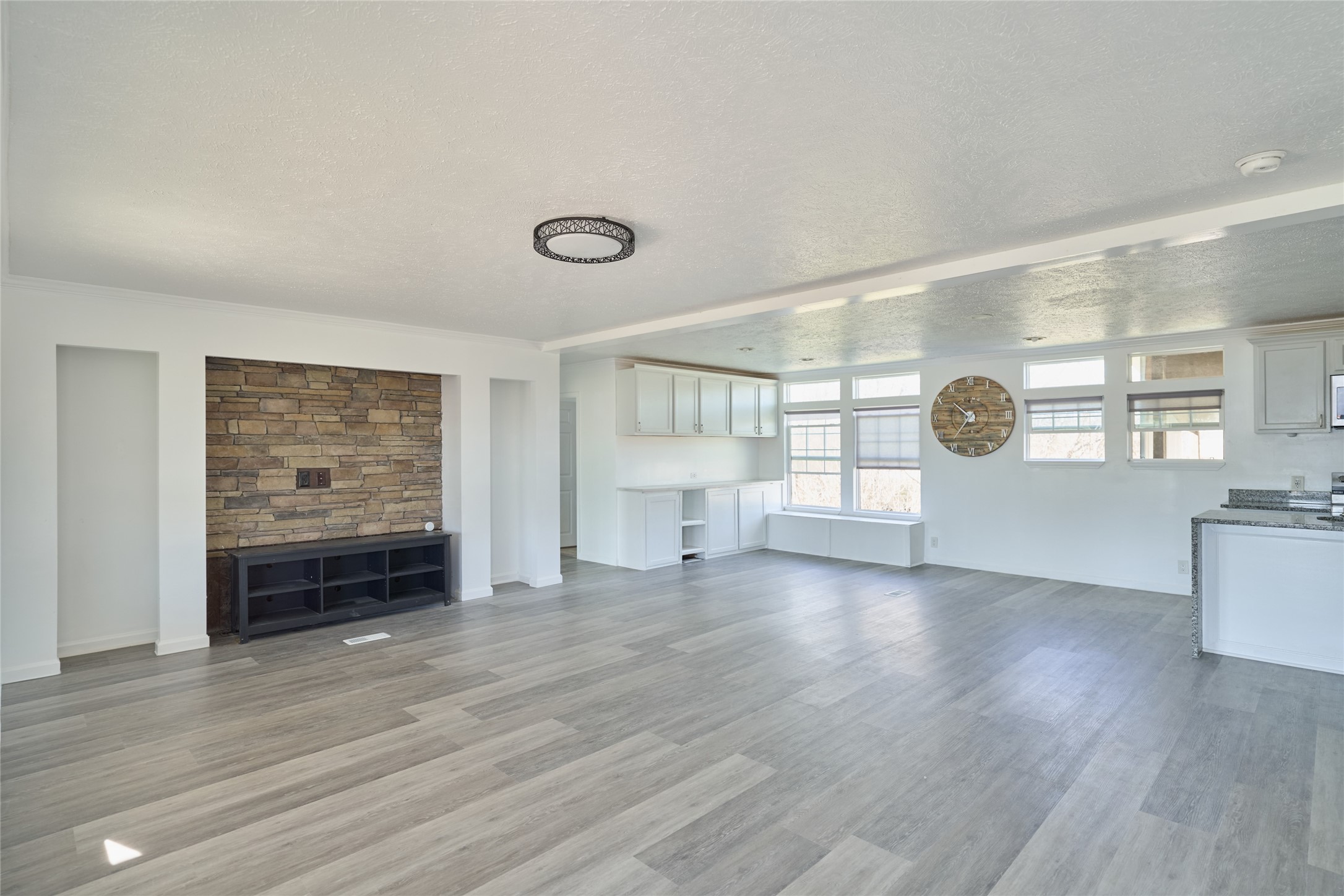 928 Coen Road Rosharon, TX 77583 - Photo 5 of 18 wooden floor in an empty room with a window