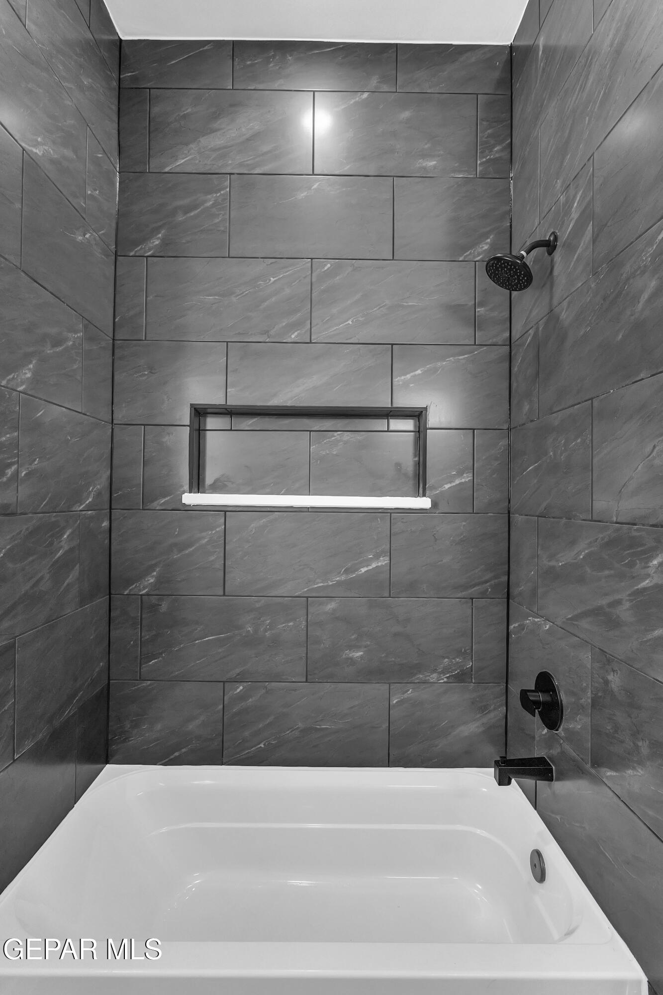 7264 Cimarron Rim Drive El Paso, TX 79911 - Photo 19 of 21 a bathroom with a bathtub