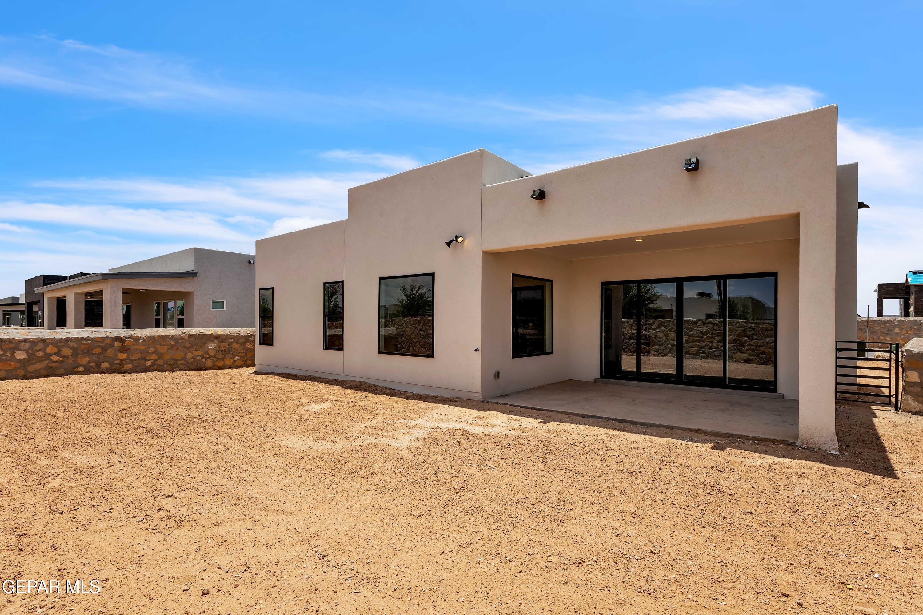7264 Cimarron Rim Drive El Paso, TX 79911 - Photo 21 of 21 a house with yard in front of it