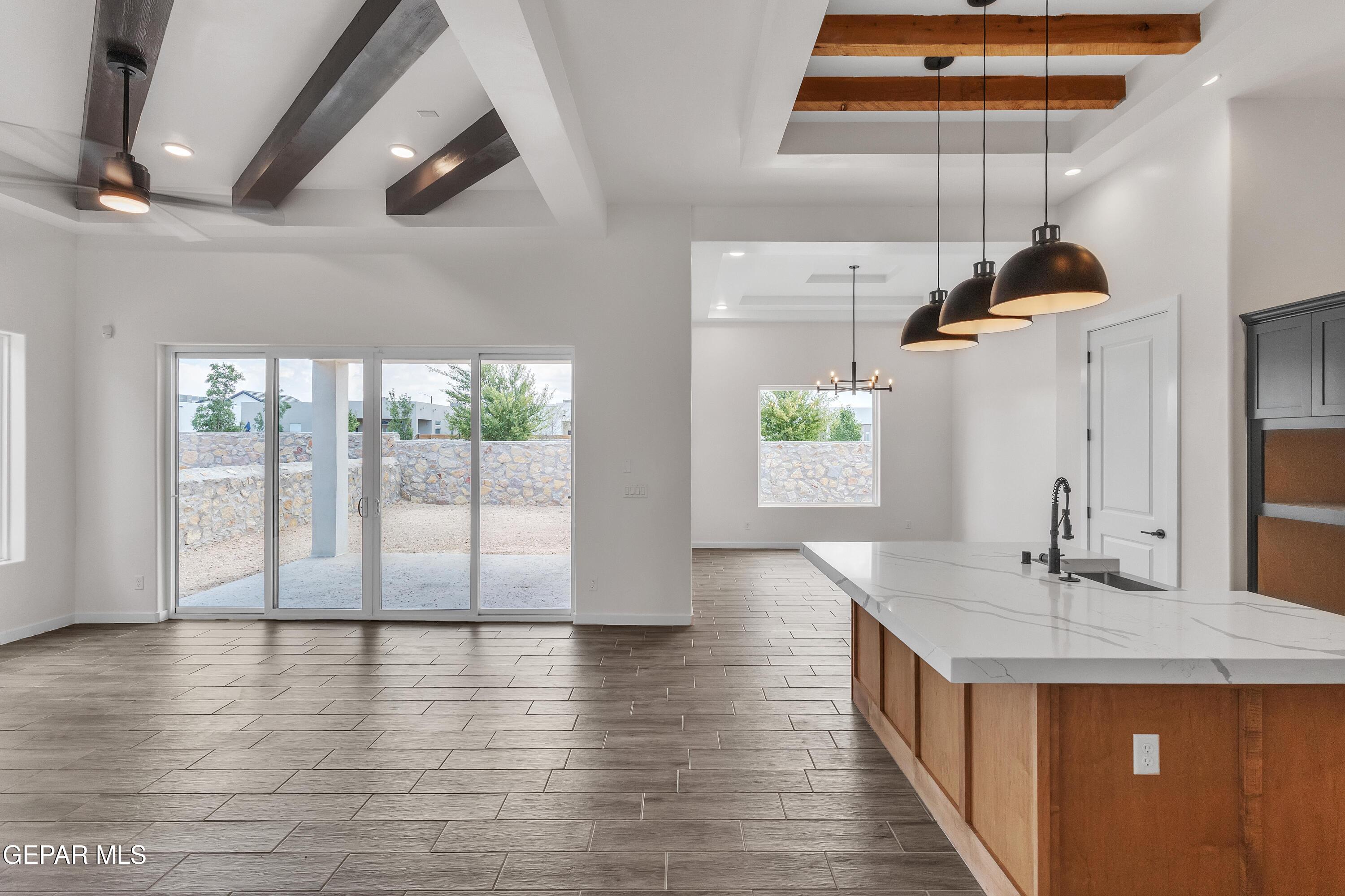 7264 Cimarron Rim Drive El Paso, TX 79911 - Photo 10 of 21 a bathroom with a double vanity sink and a large mirror