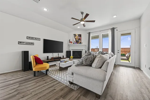 a view of a house with a yard and garden