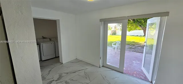 an empty room with window