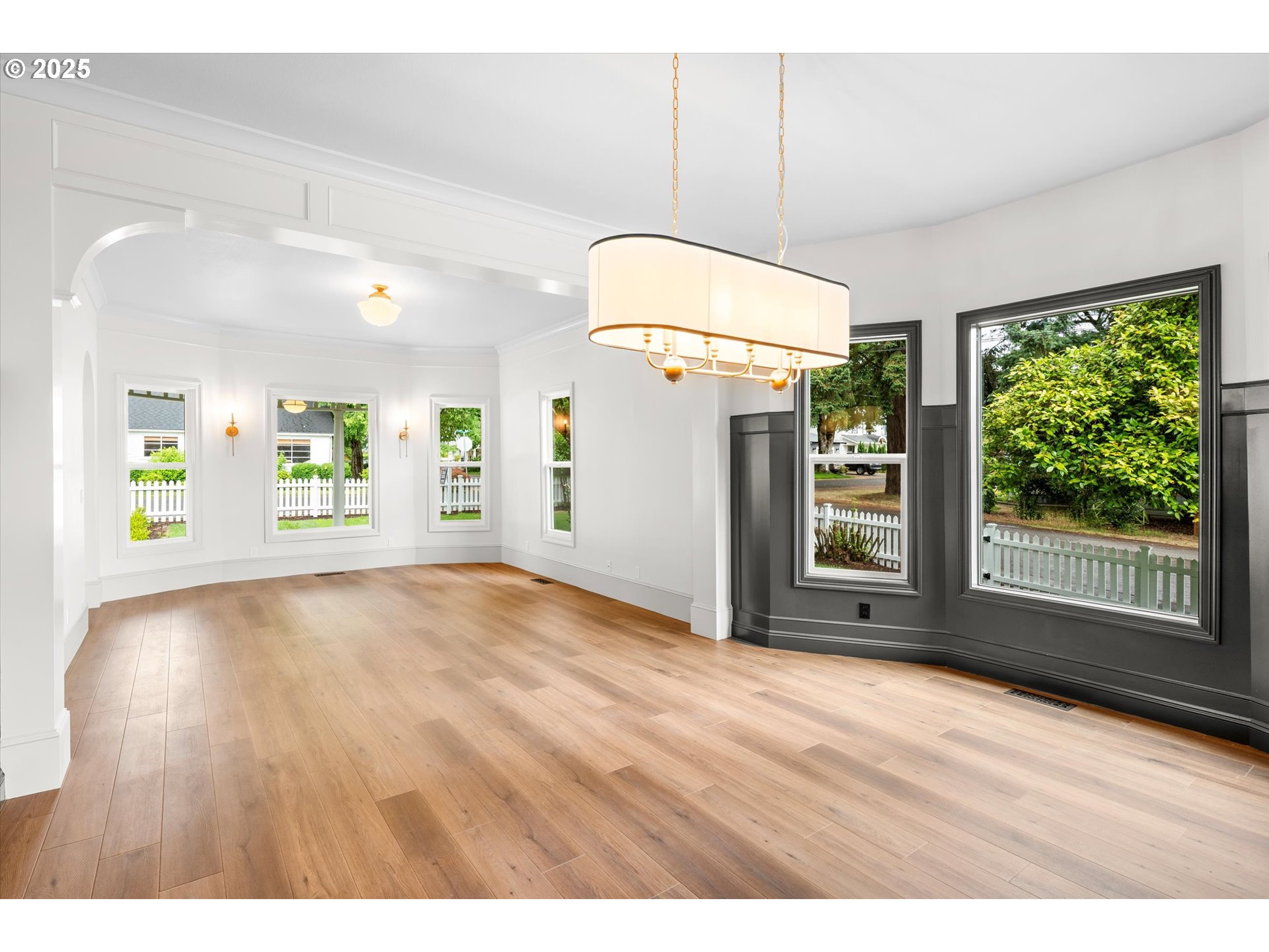 2089 5th Avenue West Linn, OR 97068 - Photo 14 of 34 a view of an empty room with a window and wooden floor