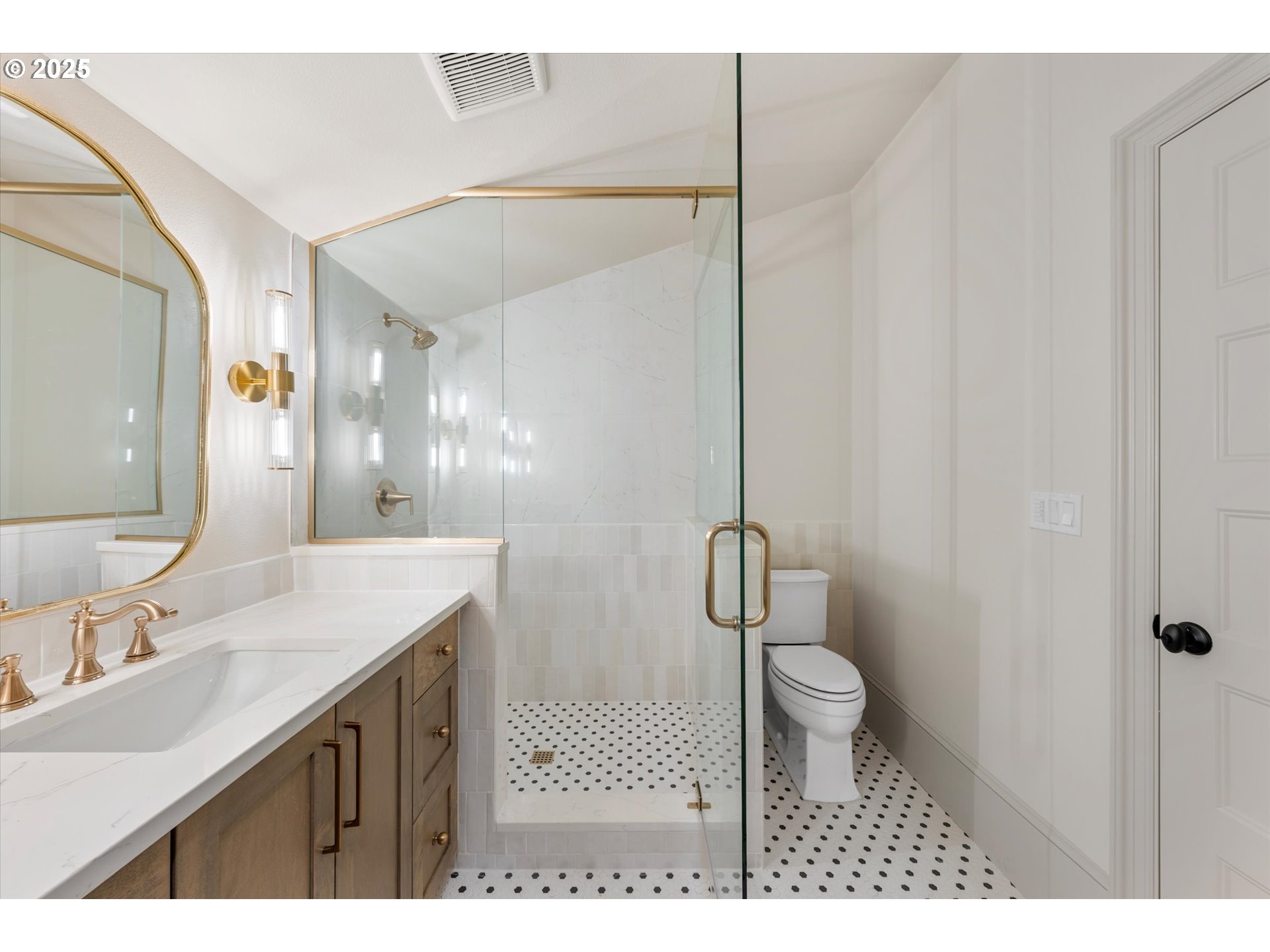 2089 5th Avenue West Linn, OR 97068 - Photo 25 of 34 a bathroom with a sink a toilet a mirror and shower