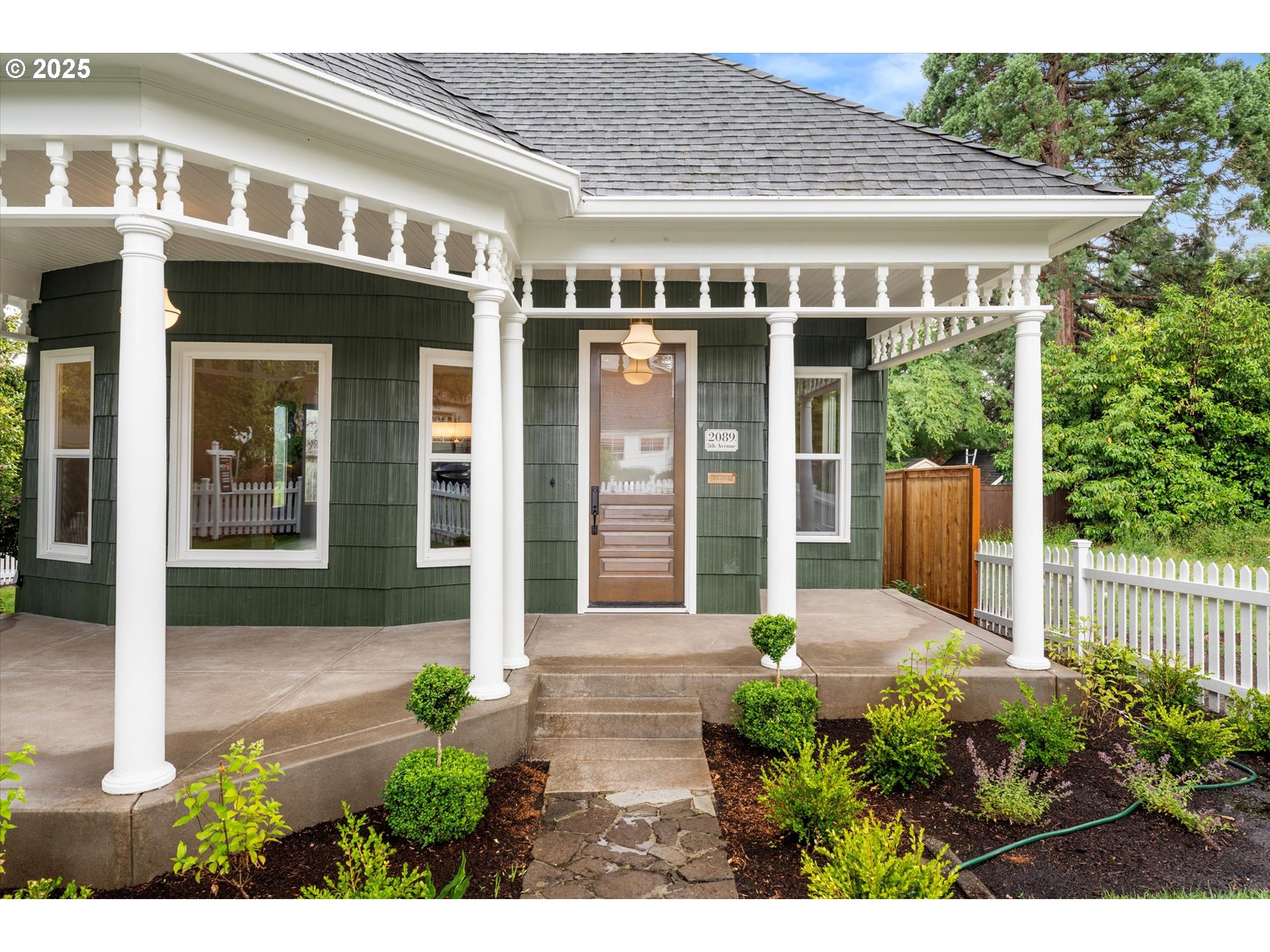 2089 5th Avenue West Linn, OR 97068 - Photo 3 of 34 a front view of a house with garden