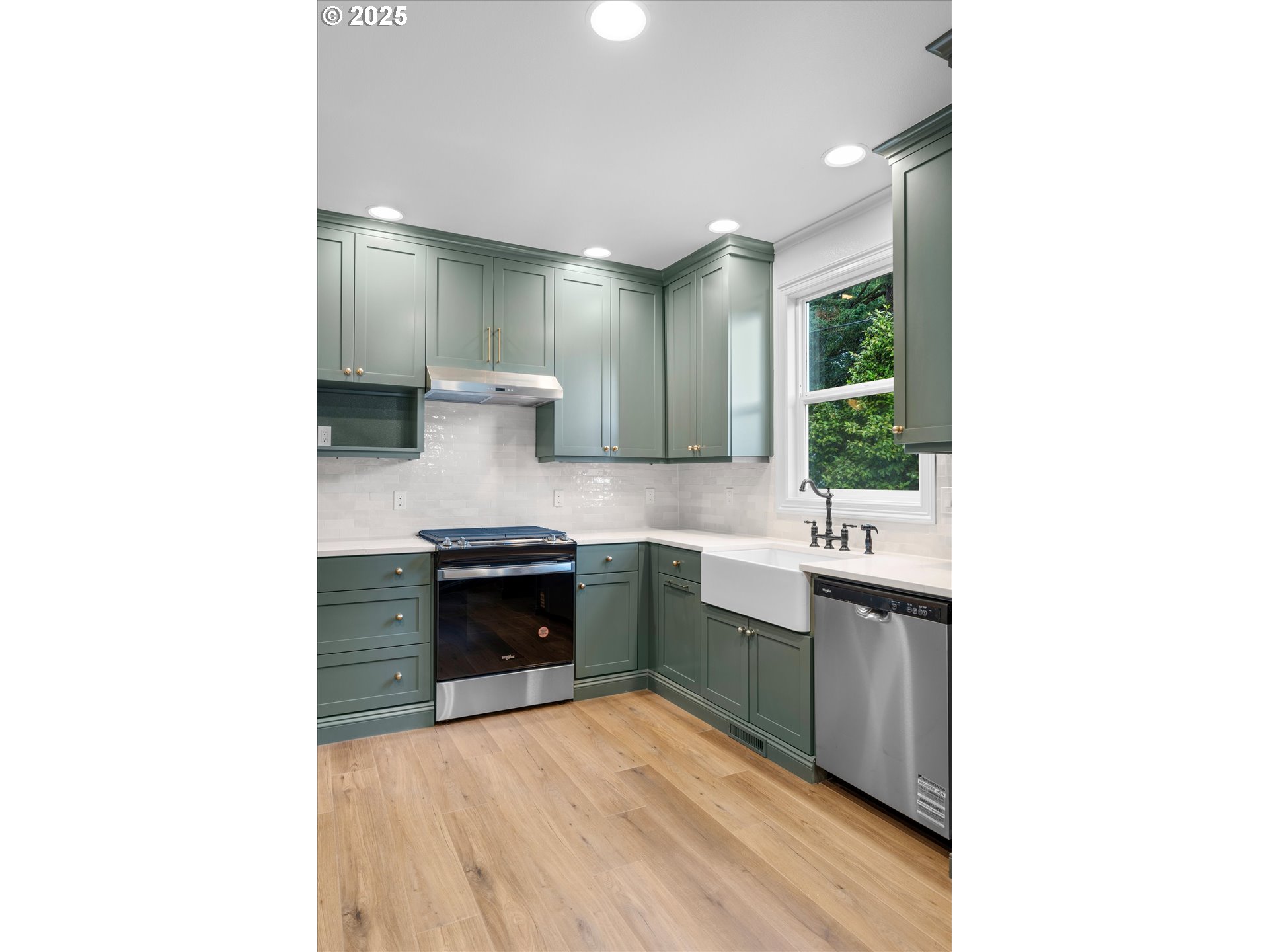 2089 5th Avenue West Linn, OR 97068 - Photo 33 of 34 a kitchen with stainless steel appliances granite countertop a stove and a sink