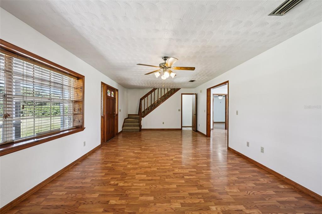 4716 Gallagher Road Plant City, FL 33565 - Photo 16 of 69 a view of a livingroom with a ceiling fan and window