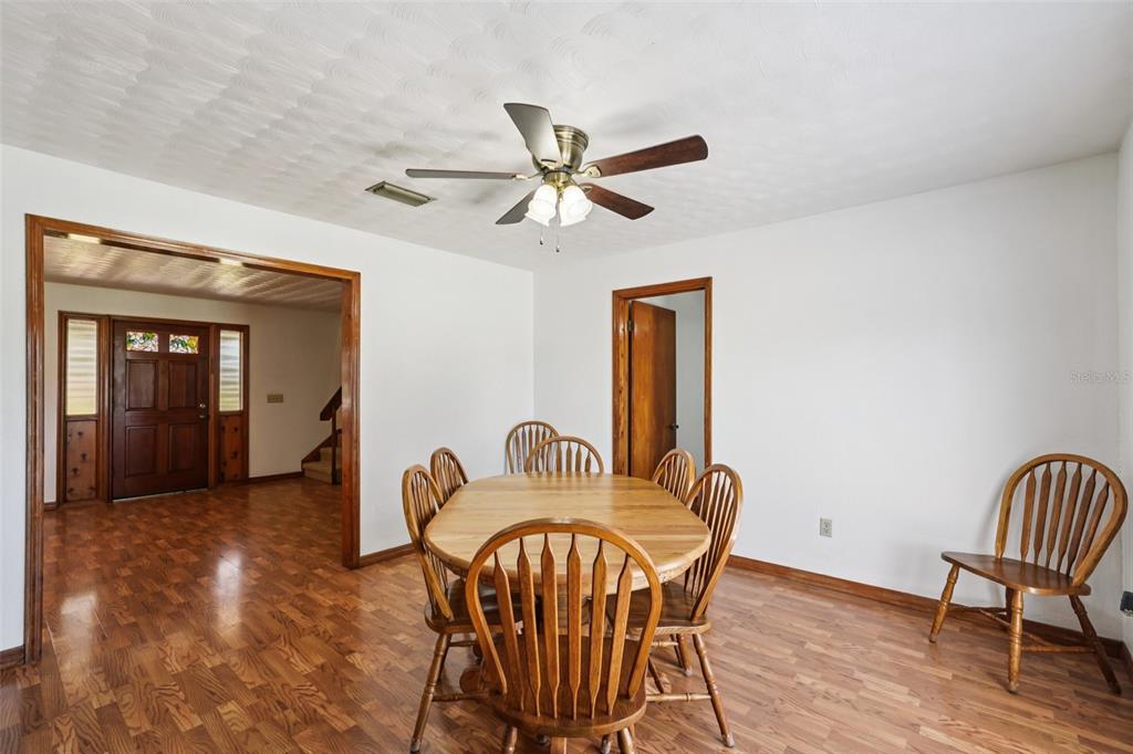 4716 Gallagher Road Plant City, FL 33565 - Photo 19 of 69 a dining room with furniture and window
