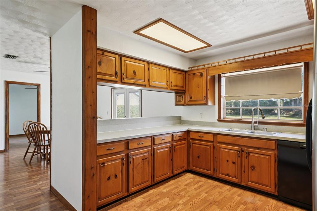 4716 Gallagher Road Plant City, FL 33565 - Photo 26 of 69 a kitchen with sink and cabinets