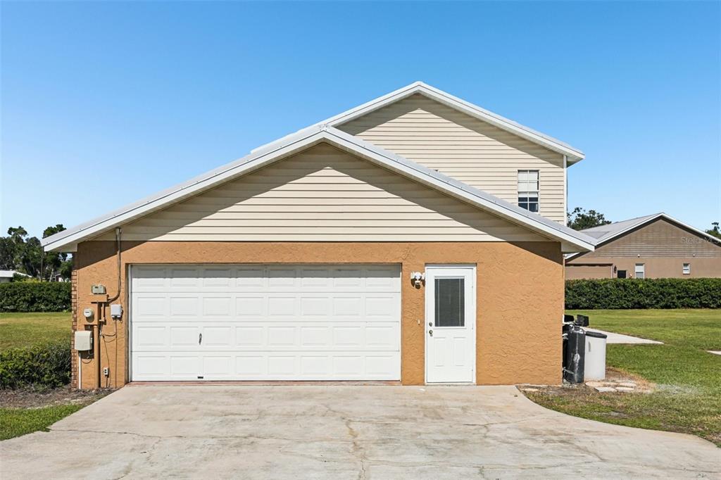 4716 Gallagher Road Plant City, FL 33565 - Photo 6 of 69 a front view of a house with a yard