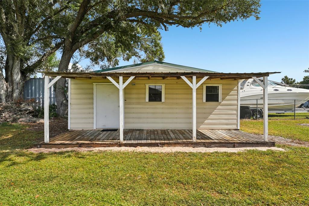 4716 Gallagher Road Plant City, FL 33565 - Photo 65 of 69 a view of a house with backyard