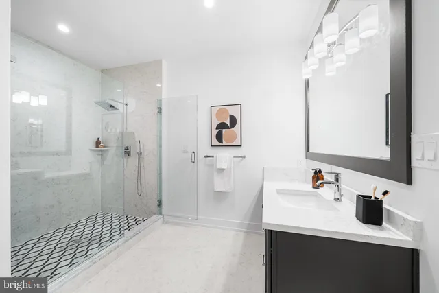 a bathroom with a sink and a window