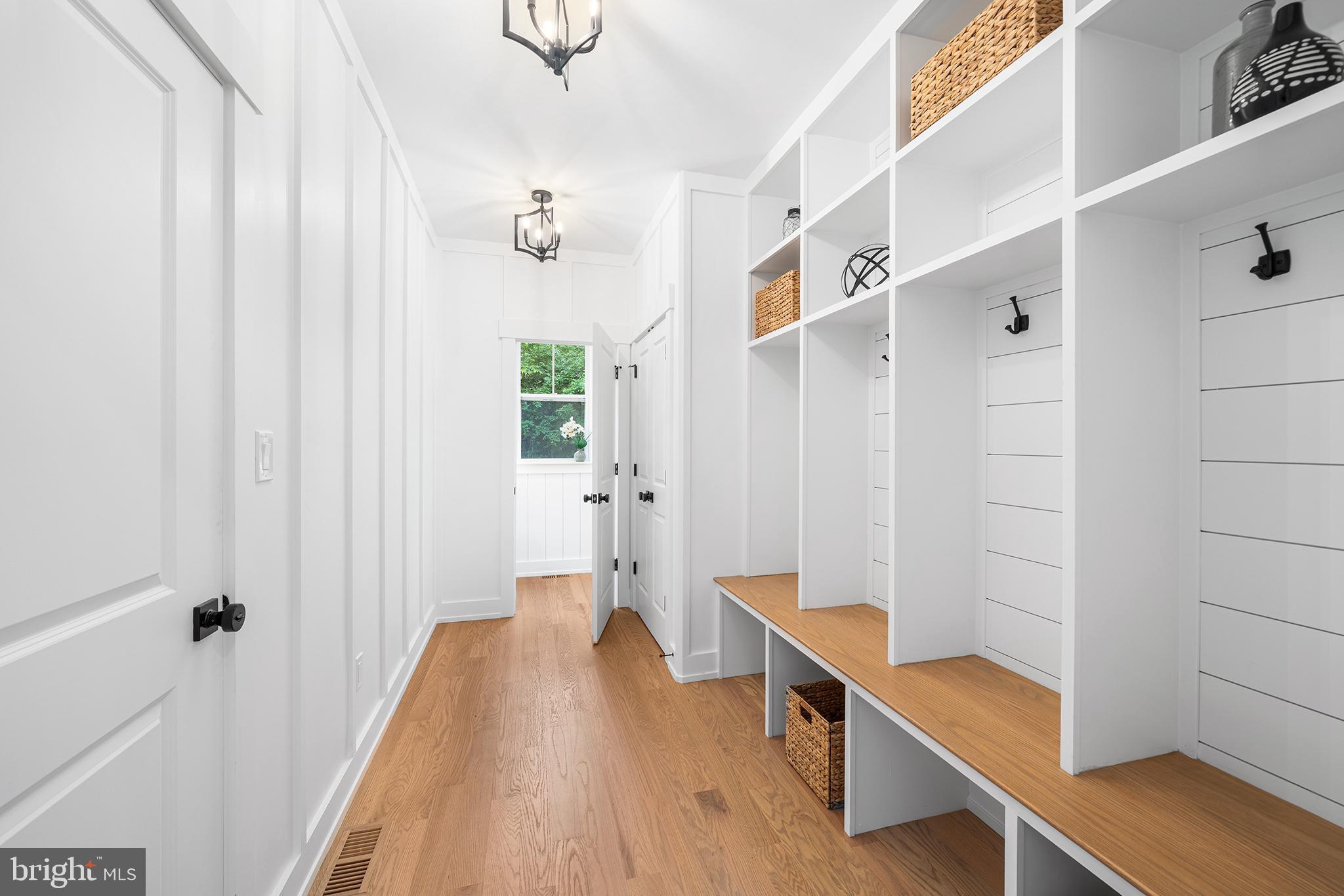 1815 Lot 2s Yost Road Blue Bell, PA 19422 - Photo 7 of 56 a hallway with white cabinets and wooden floor