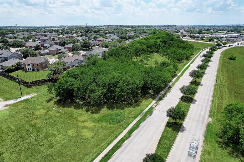 5 Bobcat Boulevard Roanoke, TX 76262 - Photo 7 of 10 an aerial view of residential houses with outdoor space and trees