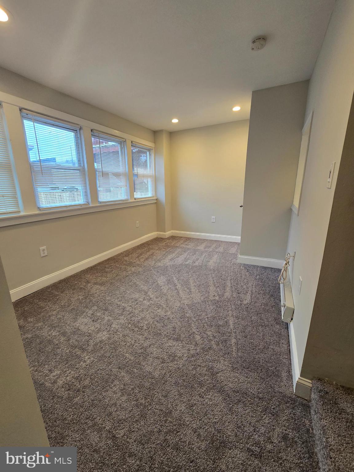4044 7th Street Northeast, Unit 2 Washington, DC 20017 - Photo 4 of 8 a view of an empty room with a window