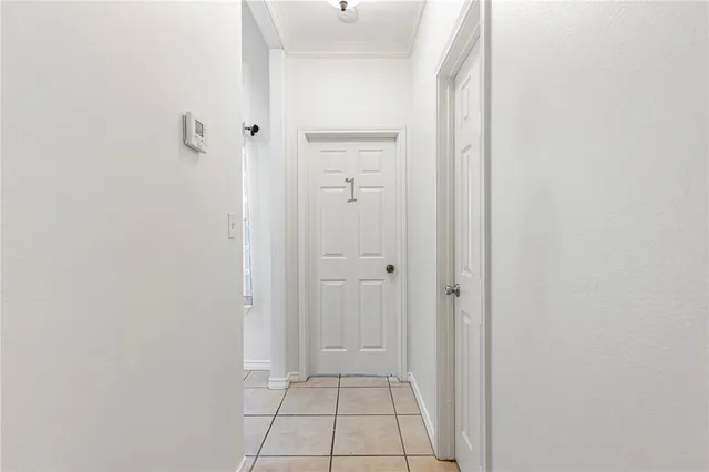 a bedroom with a bed and a fireplace