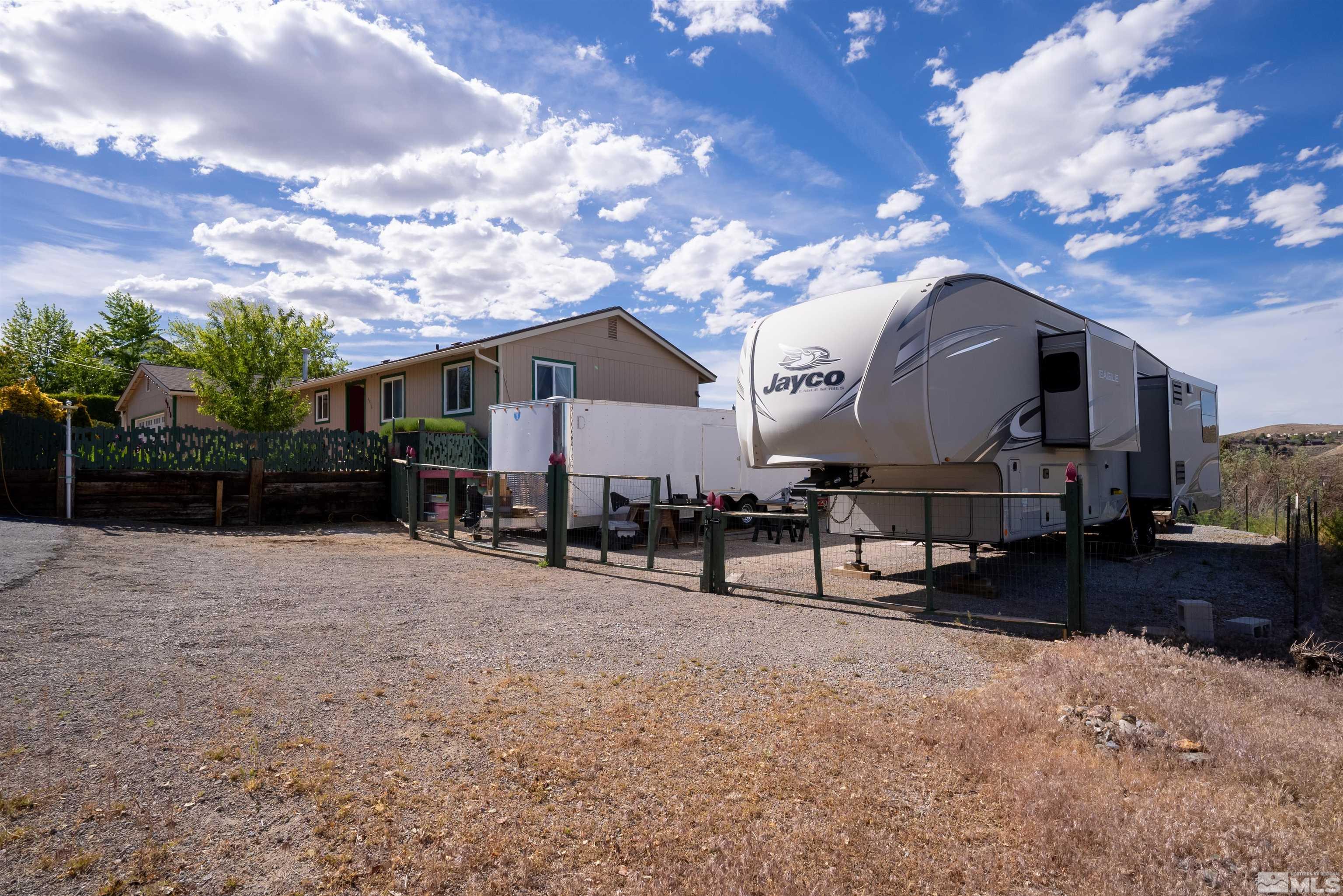 4936 Koenig Road Reno, NV 89506 - Photo 28 of 30 a view of a house with a patio