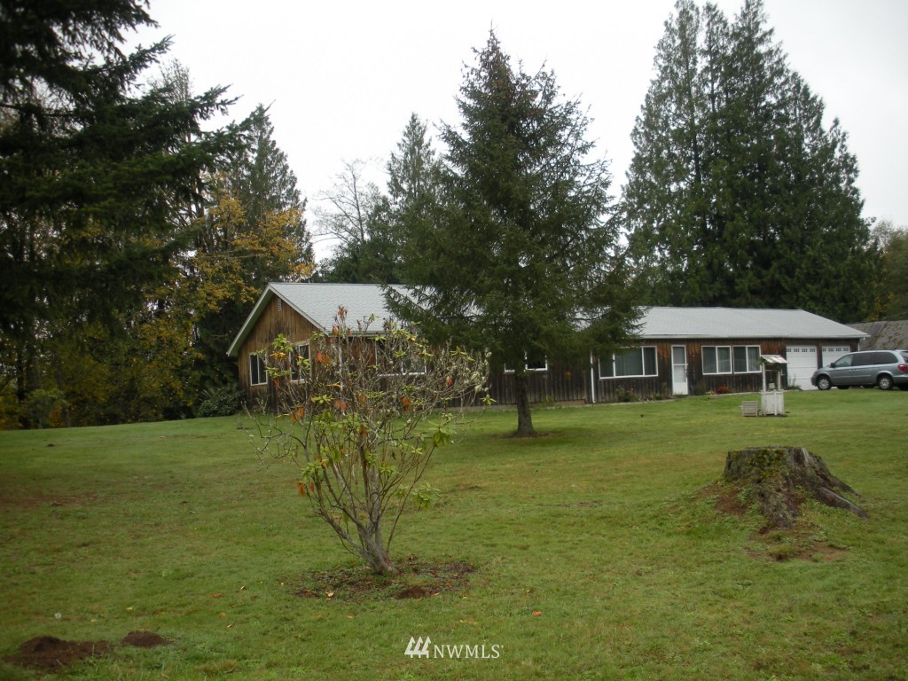 1471 Centralia Alpha Road Chehalis, WA 98532 - Photo 1 of 1 a view of a house with a backyard