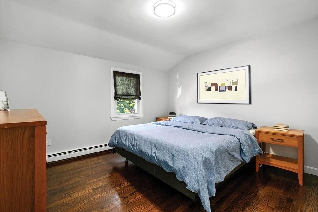 103 Stimson Street Boston, MA 02132 - Photo 12 of 26 a bedroom with bed and window