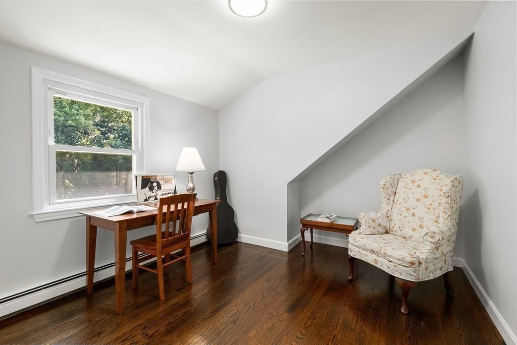103 Stimson Street Boston, MA 02132 - Photo 16 of 26 a view of a workspace with furniture and a window