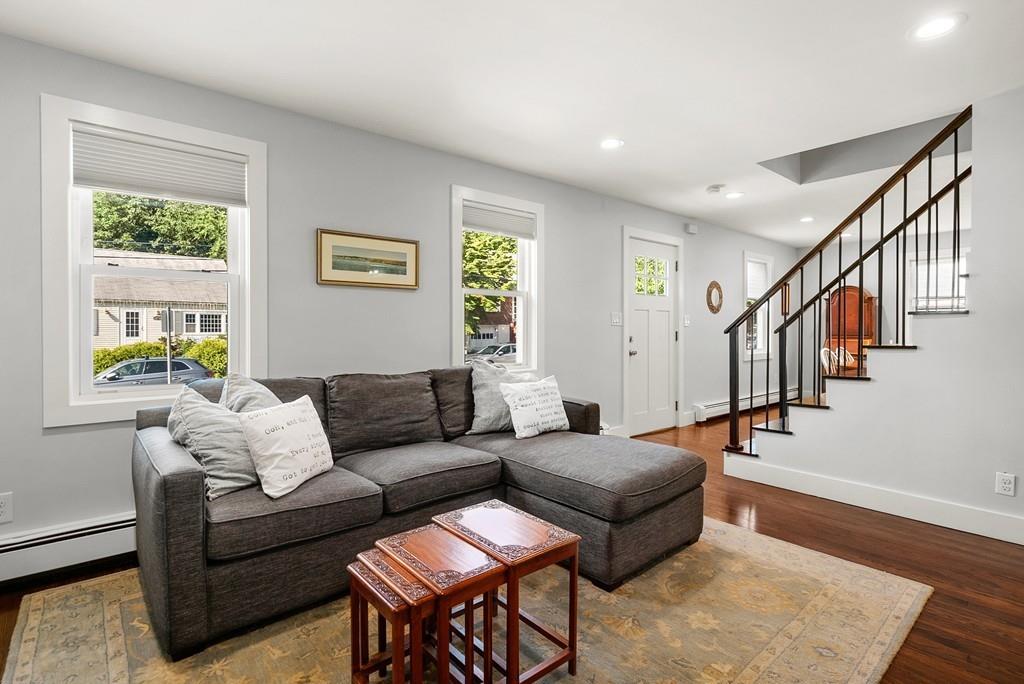 103 Stimson Street Boston, MA 02132 - Photo 6 of 26 a living room with furniture and wooden floor