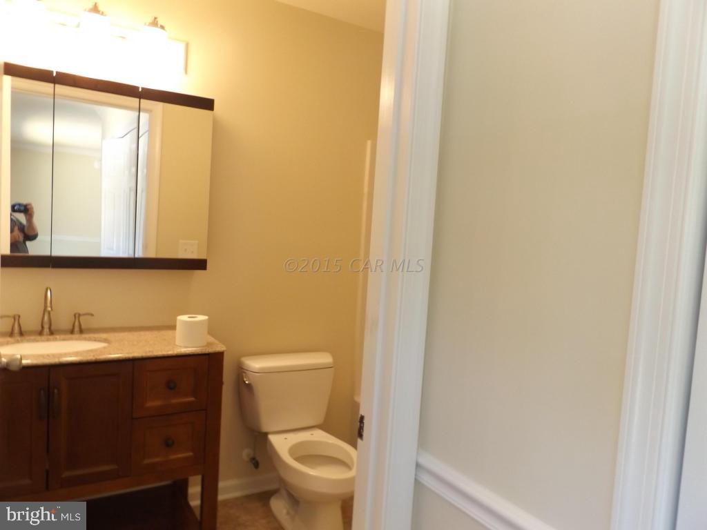 27100 Mt Vernon Road Princess Anne, MD 21853 - Photo 15 of 22 a bathroom with a sink and a toilet