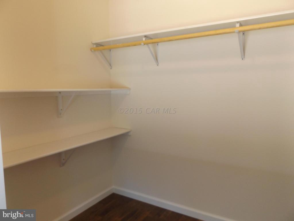 27100 Mt Vernon Road Princess Anne, MD 21853 - Photo 17 of 22 a view of a room with racks on the wall