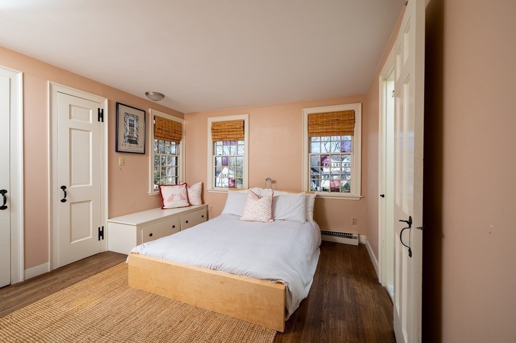 35 Lantern Lane Cohasset, MA 02025 - Photo 14 of 20 a bedroom with a large bed and a window