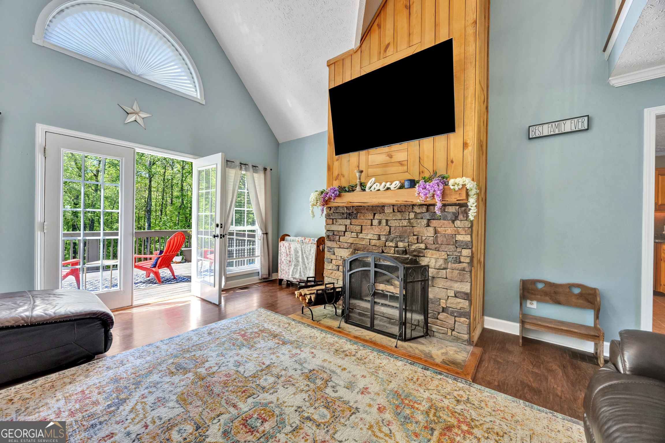 115 Crestview Lane Newborn, GA 30056 - Photo 12 of 53 a living room with furniture and a flat screen tv