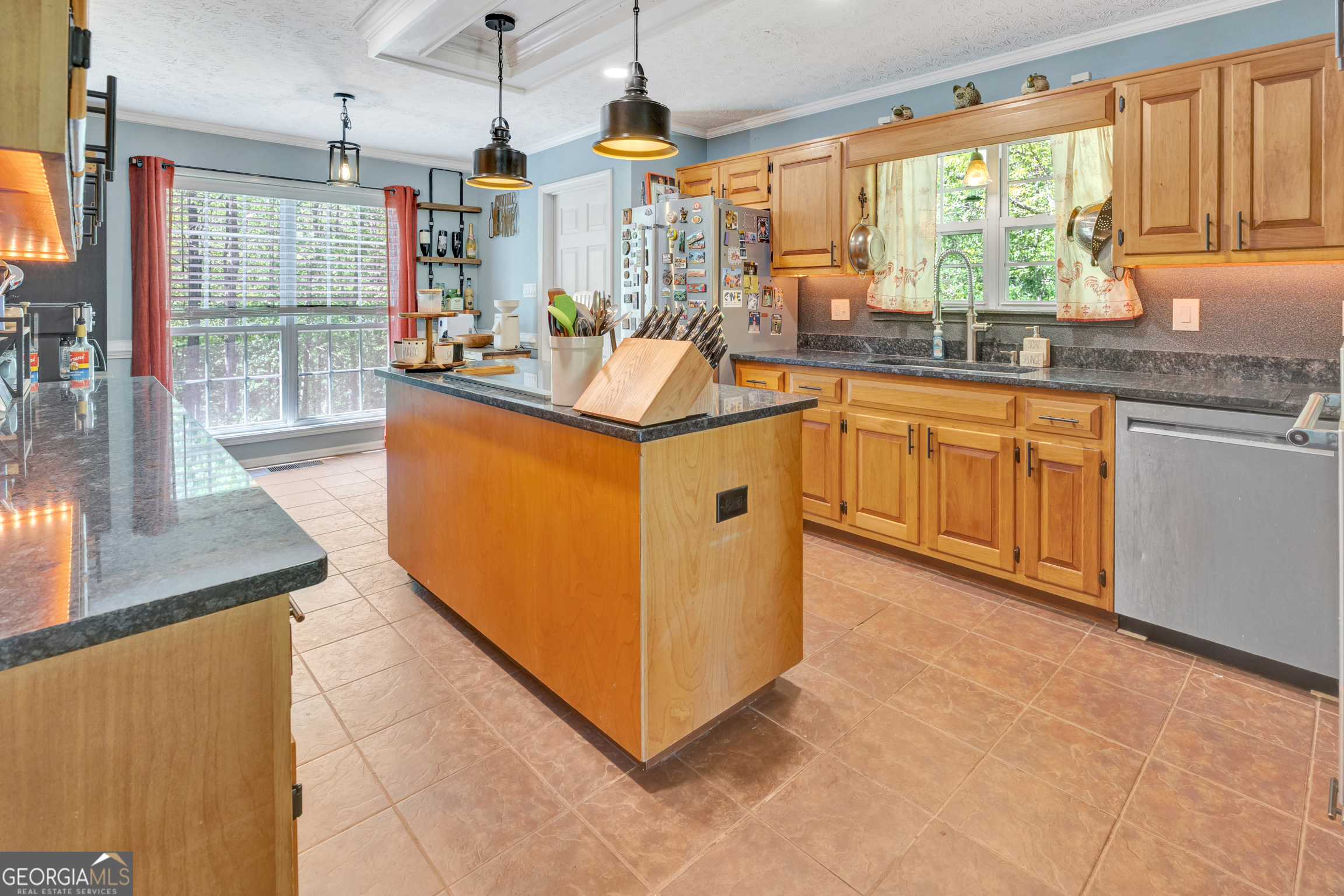 115 Crestview Lane Newborn, GA 30056 - Photo 16 of 53 a kitchen with stainless steel appliances granite countertop a stove a sink and a microwave