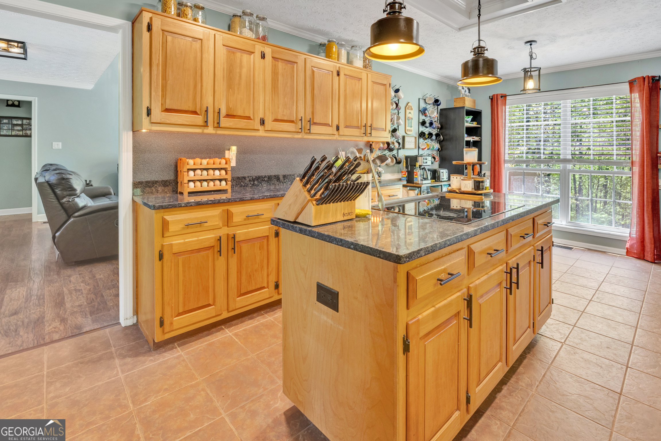 115 Crestview Lane Newborn, GA 30056 - Photo 17 of 53 a kitchen with stainless steel appliances granite countertop a sink and cabinets