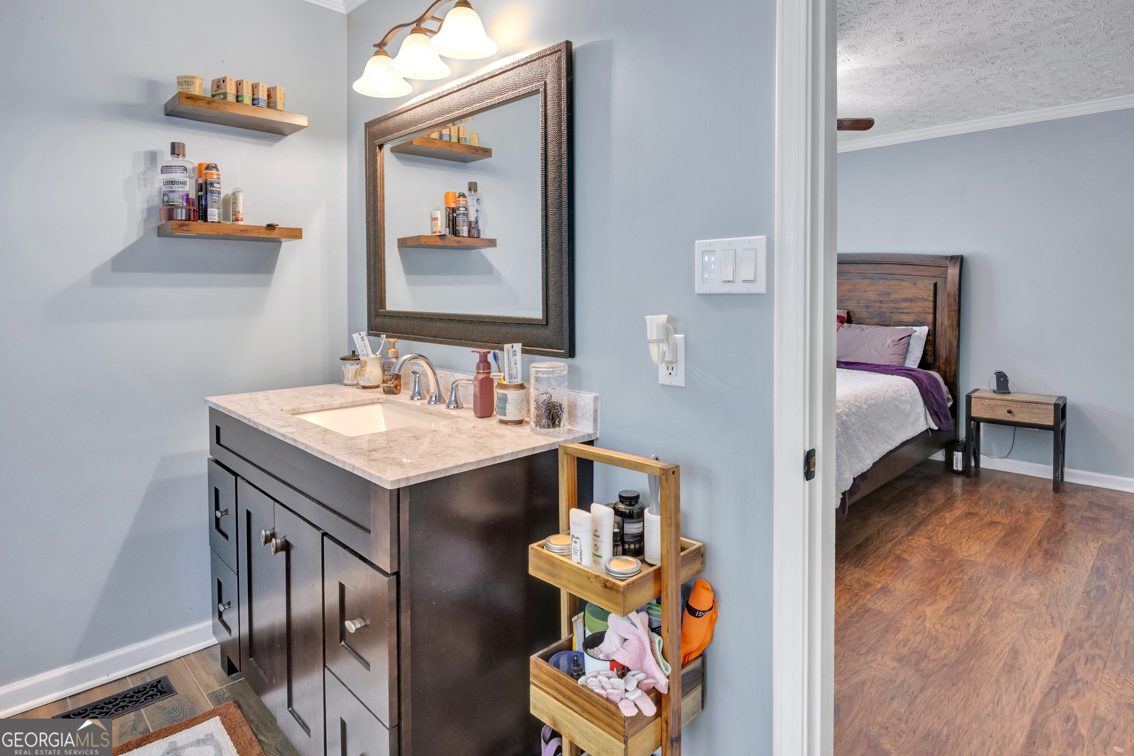 115 Crestview Lane Newborn, GA 30056 - Photo 22 of 53 a en suite bathroom with a sink and a mirror