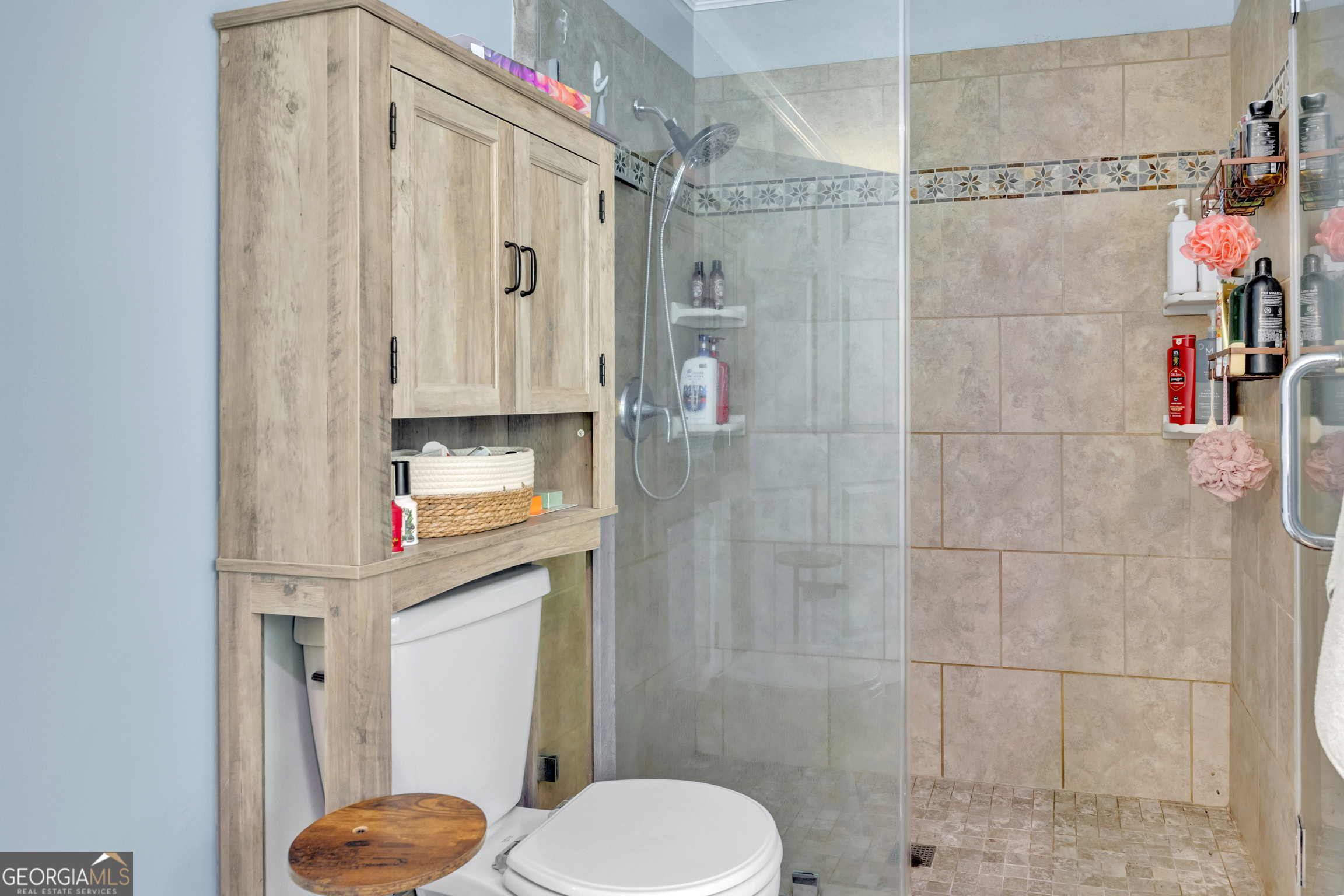 115 Crestview Lane Newborn, GA 30056 - Photo 24 of 53 a bathroom with a shower toilet and sink