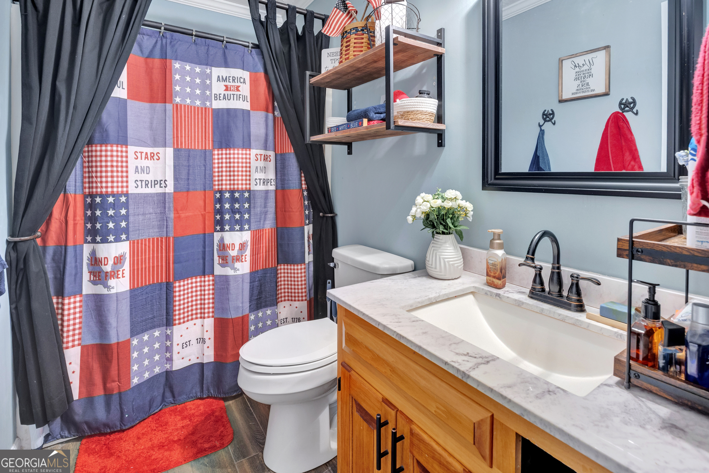 115 Crestview Lane Newborn, GA 30056 - Photo 26 of 53 a bathroom with a sink and a toilet