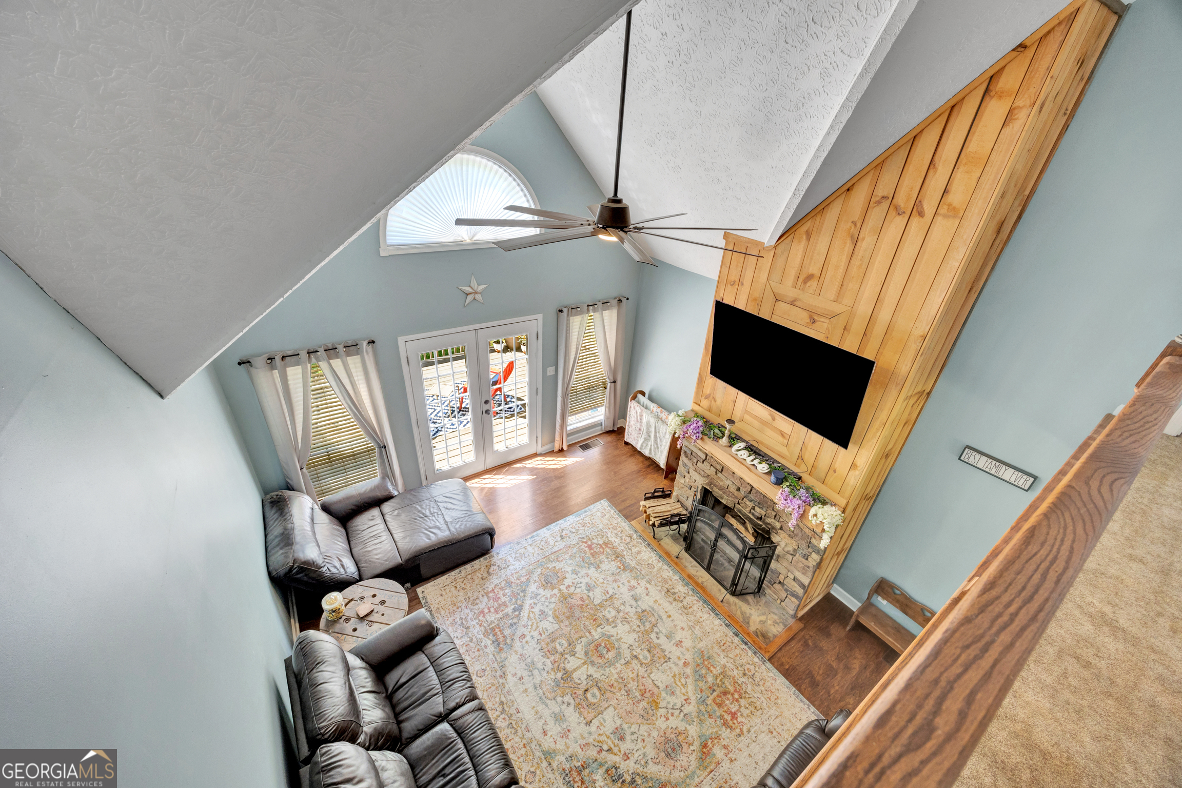 115 Crestview Lane Newborn, GA 30056 - Photo 31 of 53 a living room with furniture and a flat screen tv
