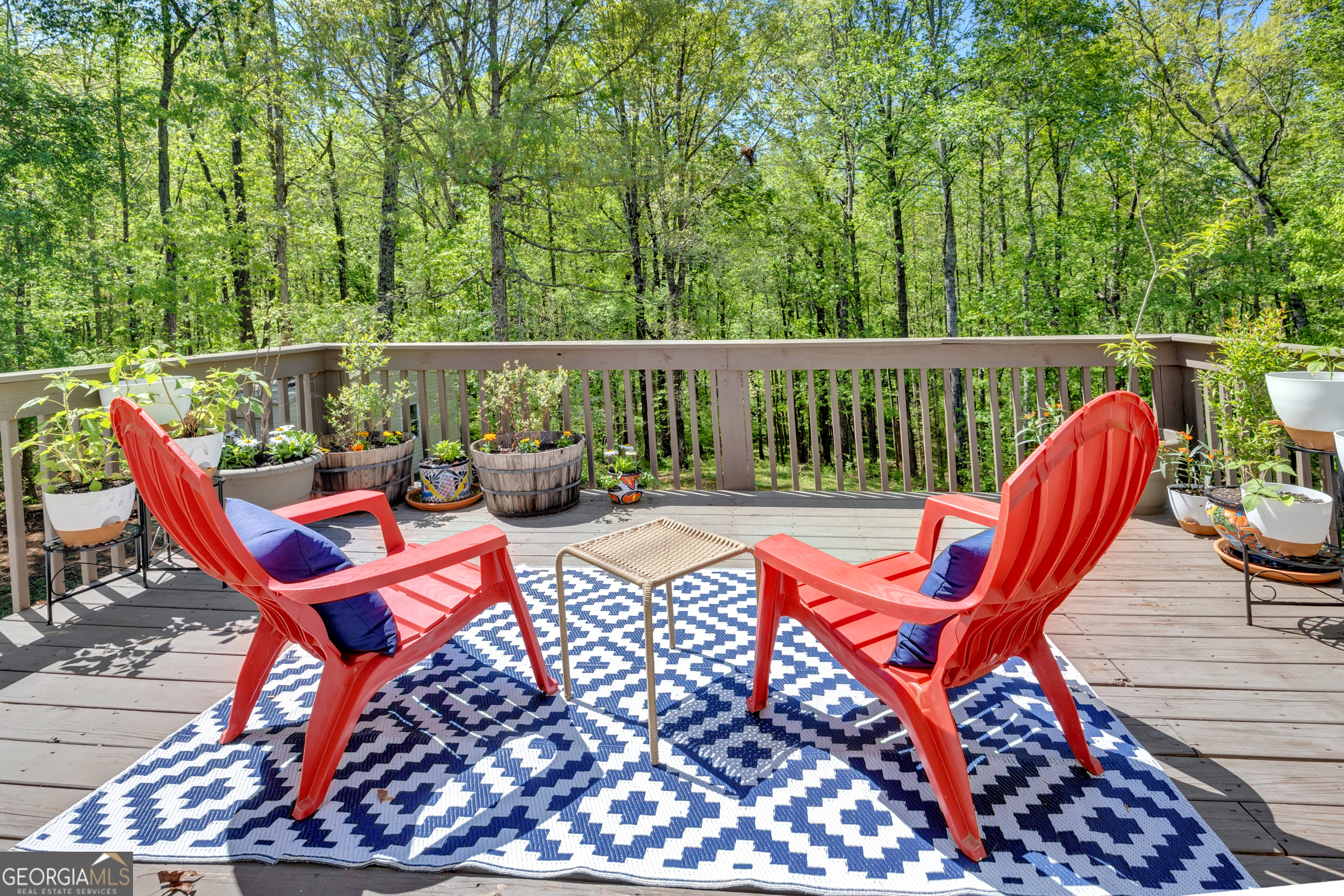 115 Crestview Lane Newborn, GA 30056 - Photo 35 of 53 a roof deck with chairs and wooden fence