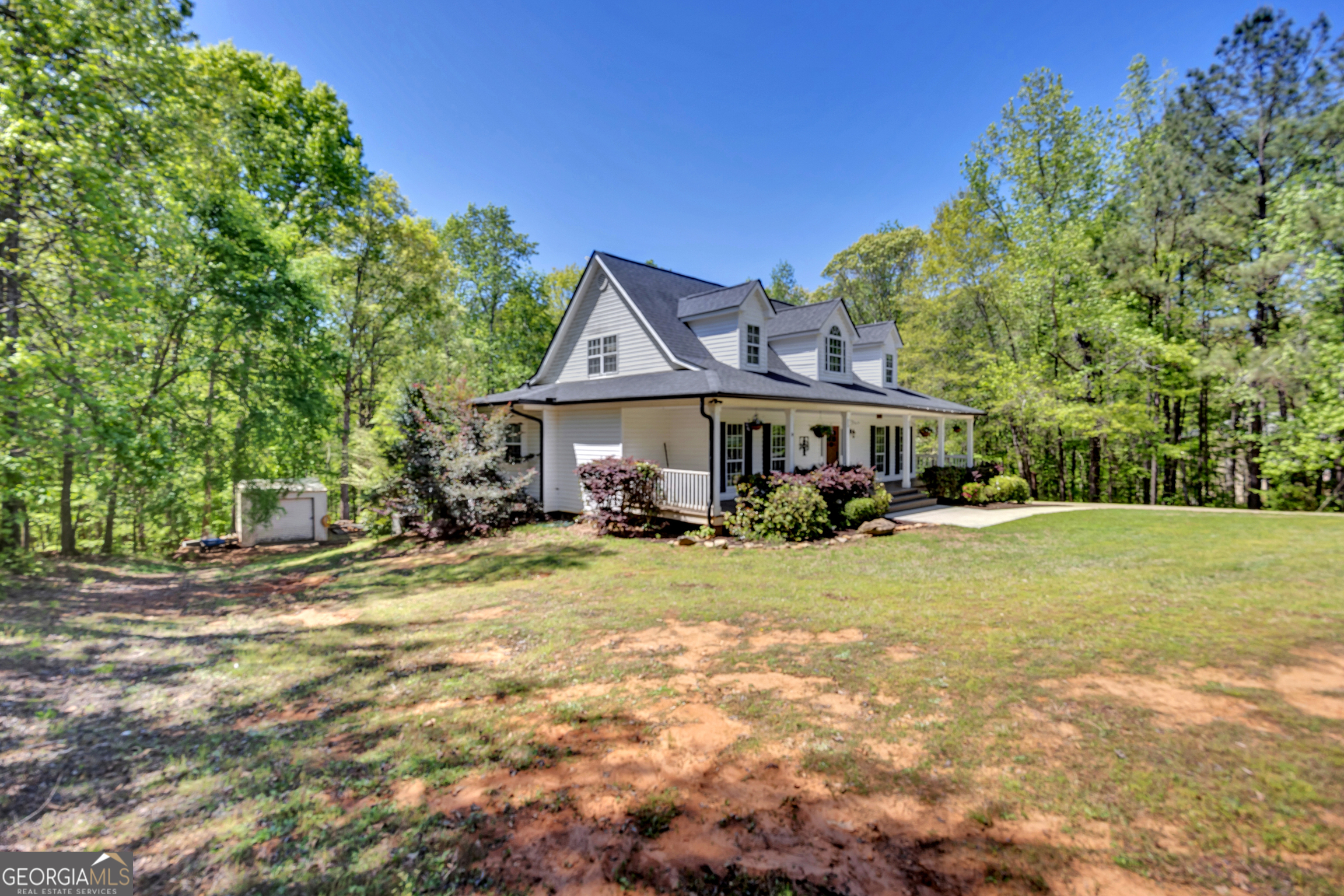 115 Crestview Lane Newborn, GA 30056 - Photo 50 of 53 a front view of a house with a yard