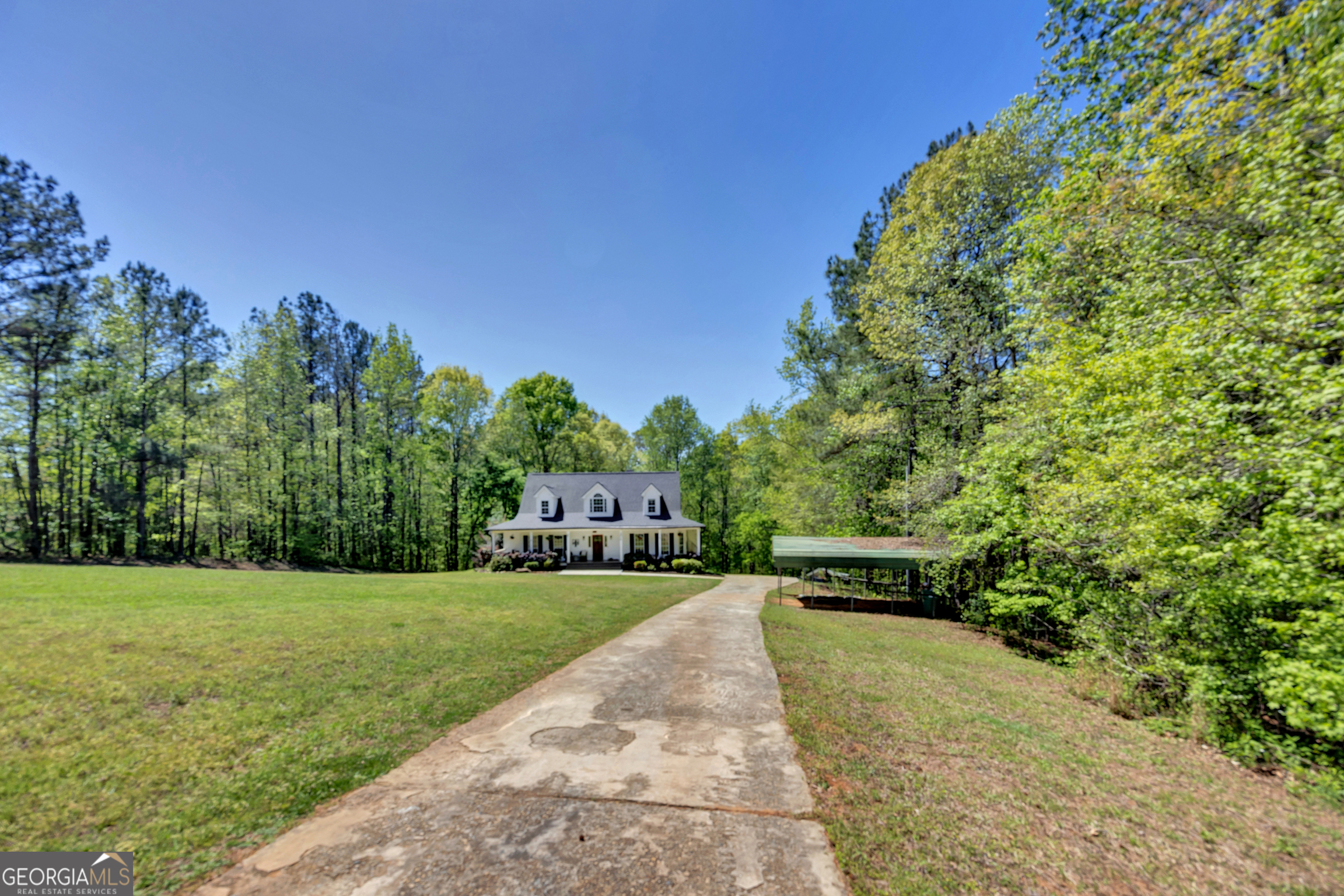 115 Crestview Lane Newborn, GA 30056 - Photo 51 of 53 a view of a yard with a house in the background