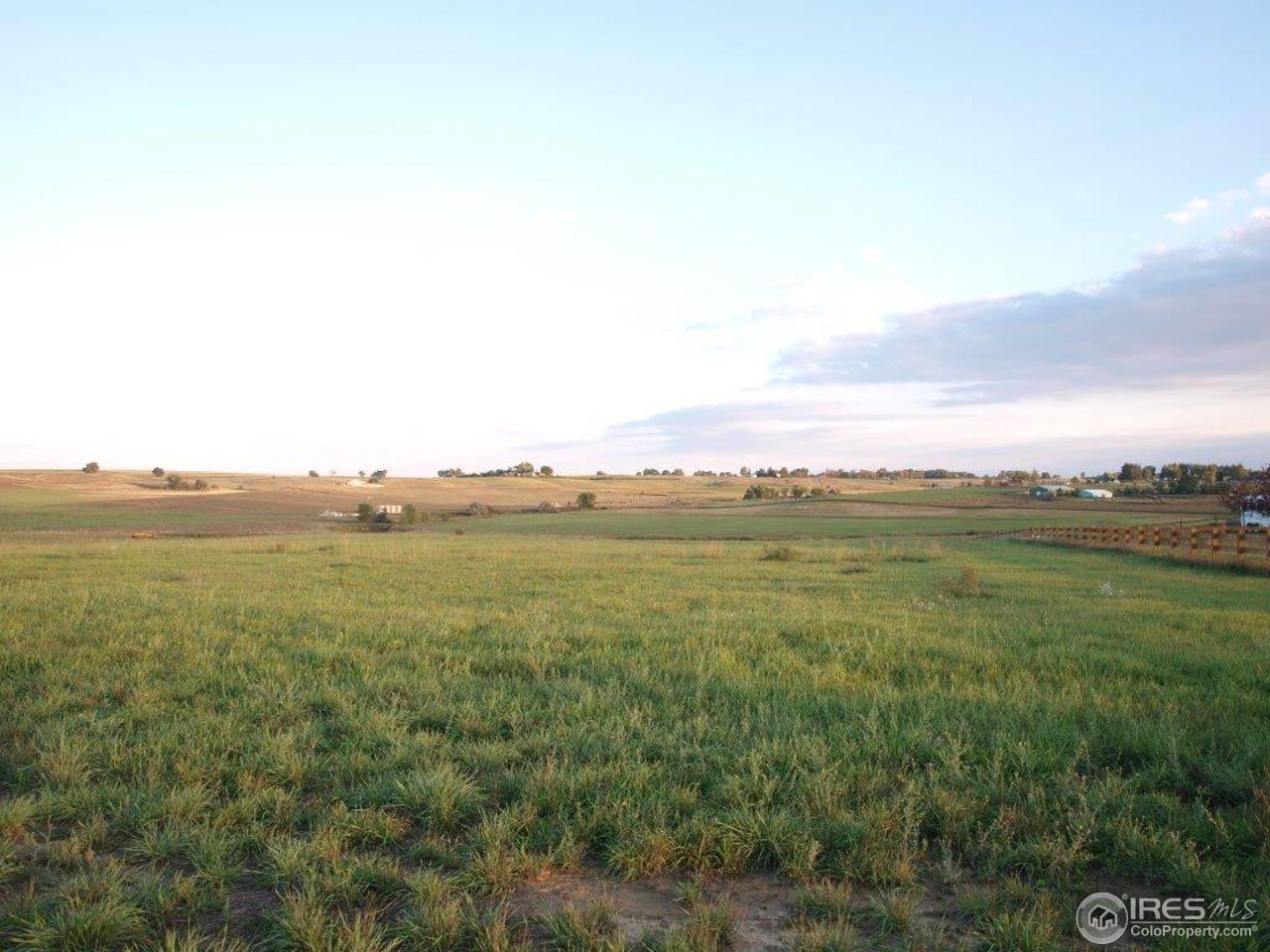1270 Mill Creek Road Berthoud, CO 80513 - Photo 1 of 25 a view of a field with an ocean