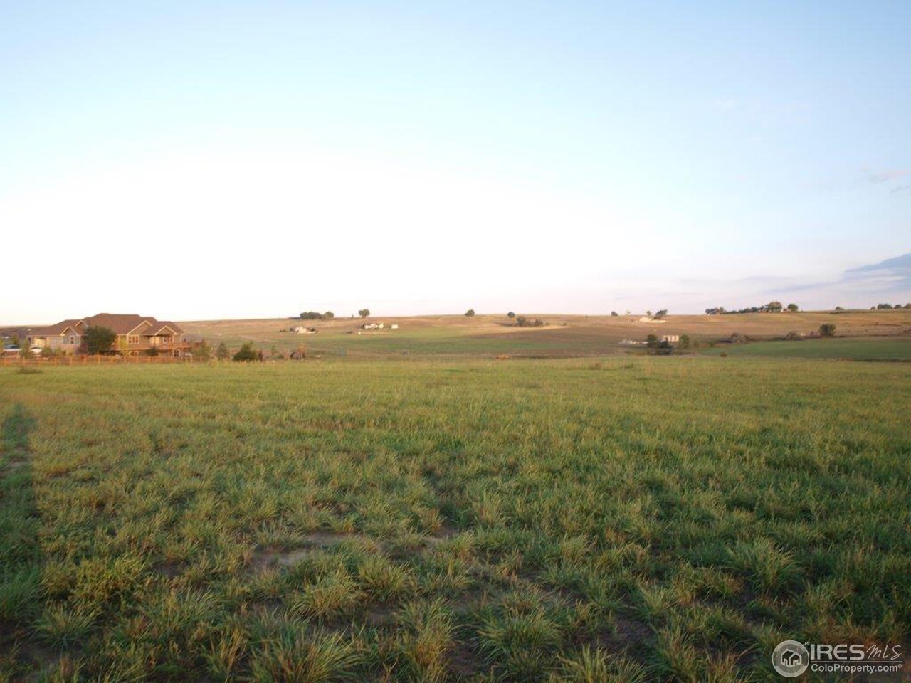 1270 Mill Creek Road Berthoud, CO 80513 - Photo 2 of 25 a view of a city with an ocean