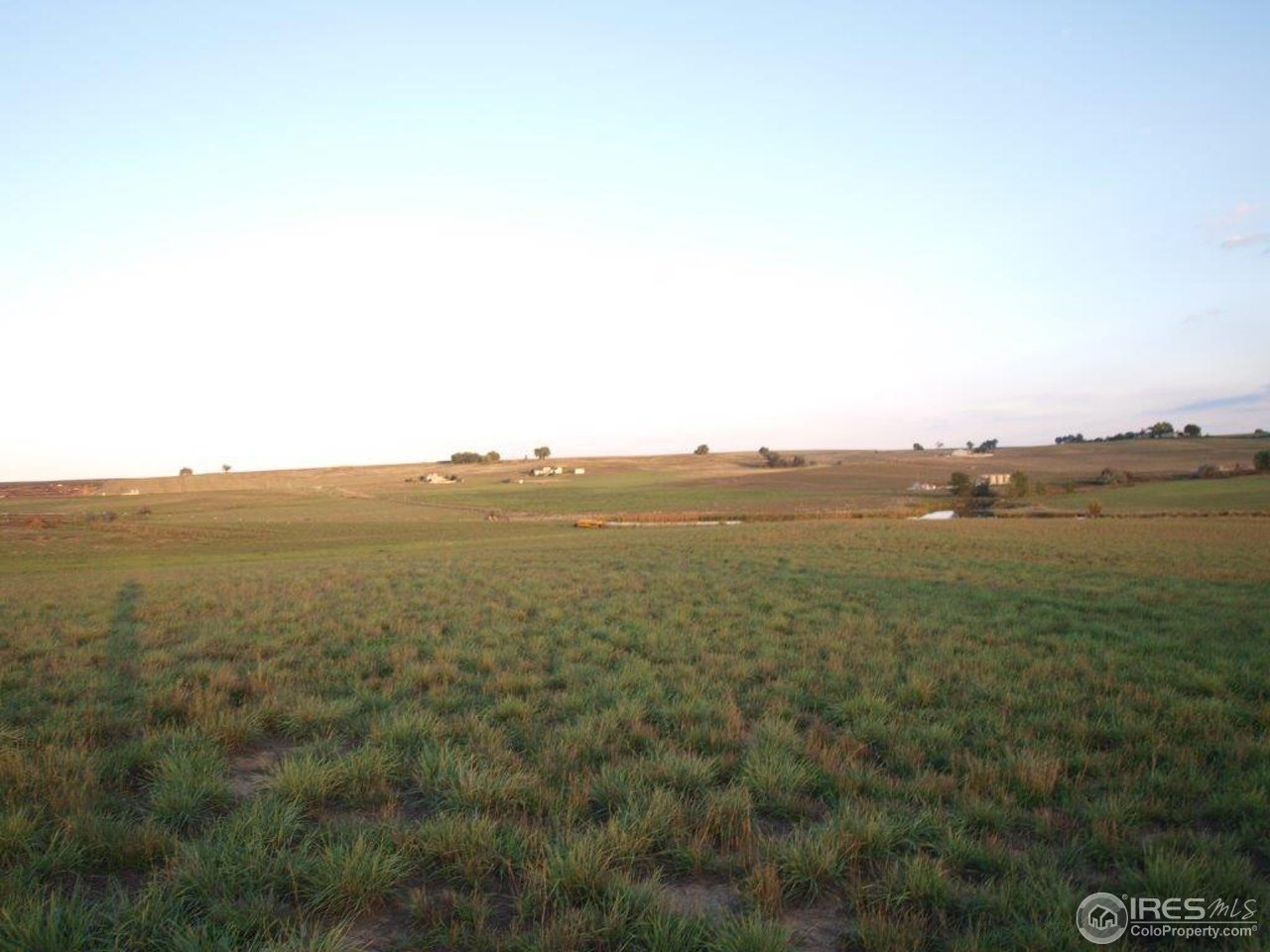 1270 Mill Creek Road Berthoud, CO 80513 - Photo 22 of 25 a view of a large body of water with a city view