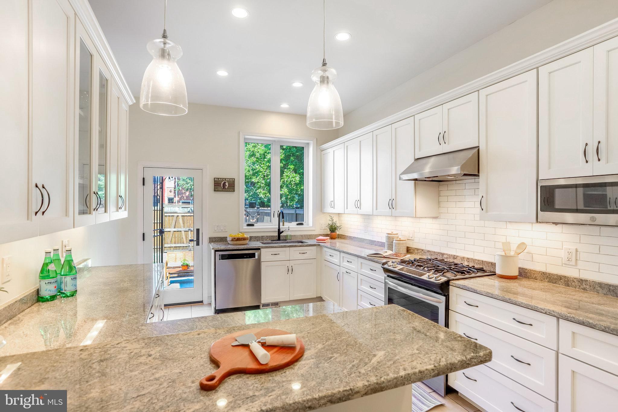 1630 6th Street Northwest Washington, DC 20001 - Photo 11 of 34 Bright LARGE and lovely multi-chef kitchen at rear